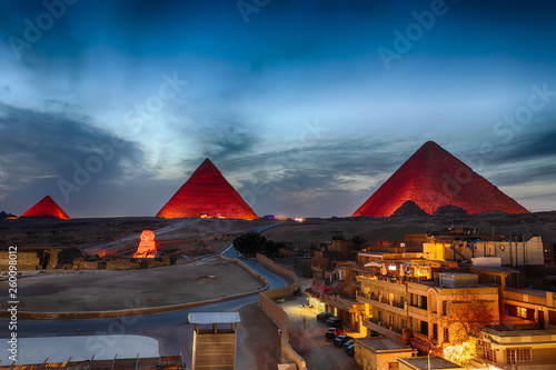 The Pyramids at night, view from Giza buildings, Egypt