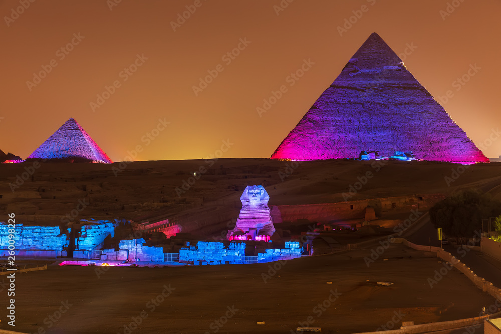 The Pyramids and the Sphinx in the night lights, Giza, Egypt
