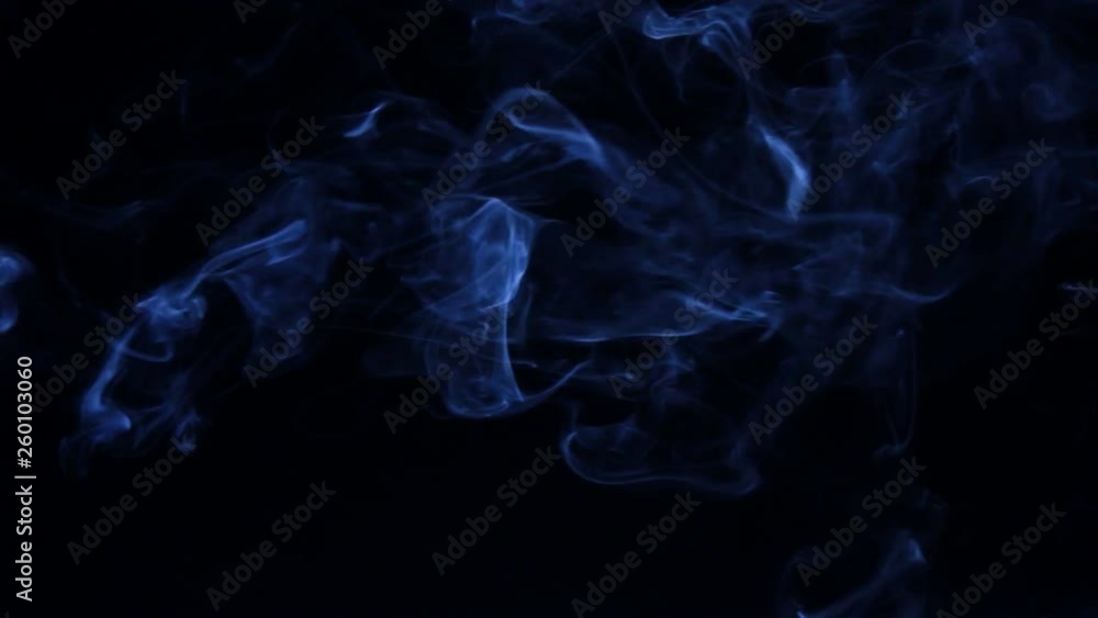 Turbulence blue smoke on a black background. Turbulence blue smoke on a black background.