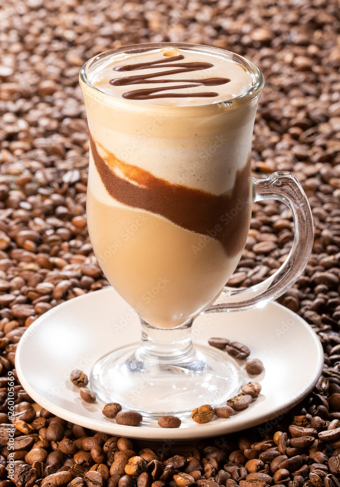 Glass cup of coffee latte - Coffea Glass cup of coffee latte - Coffea