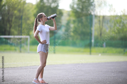 Fototapeta Naklejka Na Ścianę i Meble -  Girl and sport lifestyle doing exercises