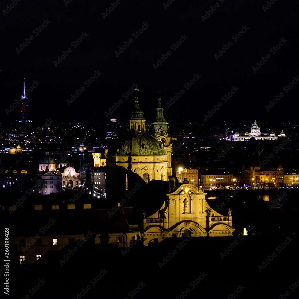 Night view on illuminated rainy Prague city