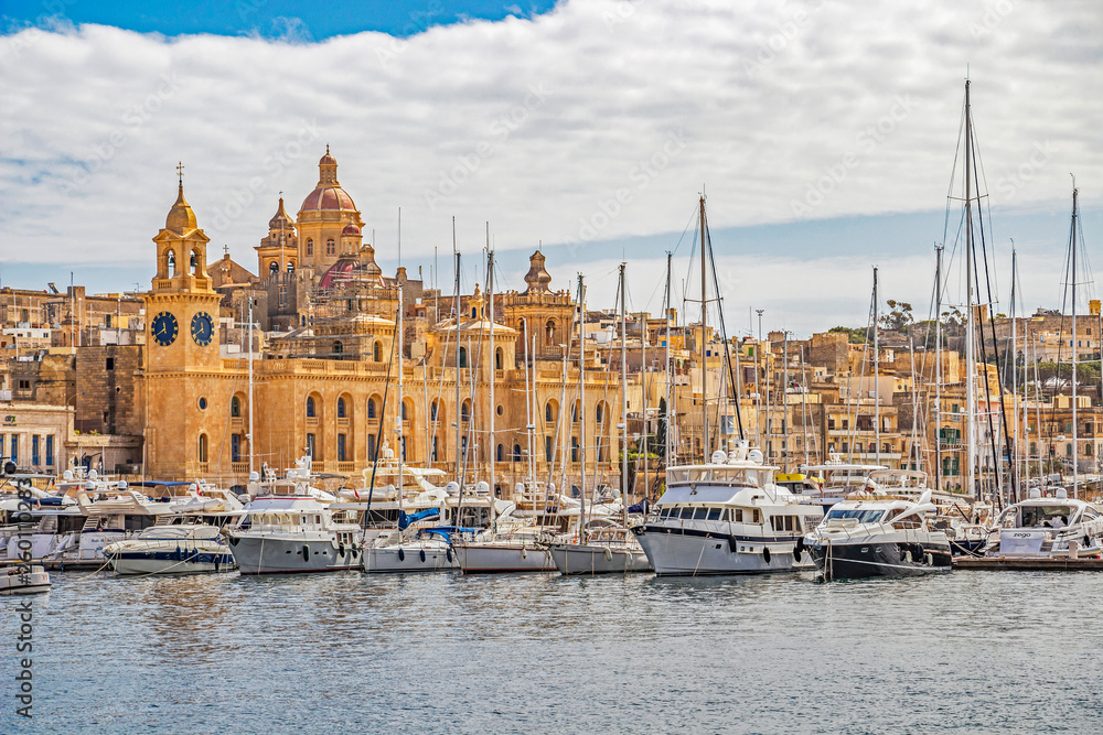 Birgu waterfront marina with sailing boats in front of the Maritime Museum and St. Lawrence Church, Dockyard Creek, Birgu, Malta