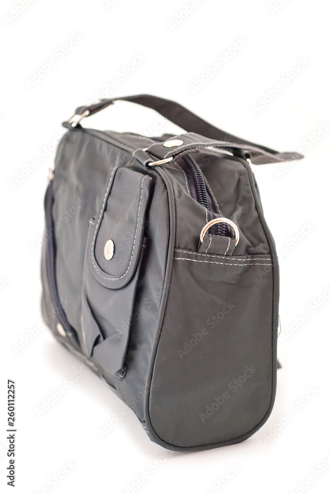Fototapeta premium female color leather bag on a white background
