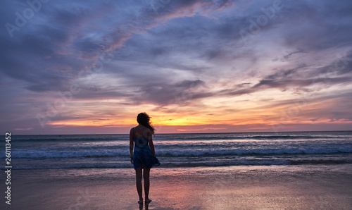 girl at sunset by the sea