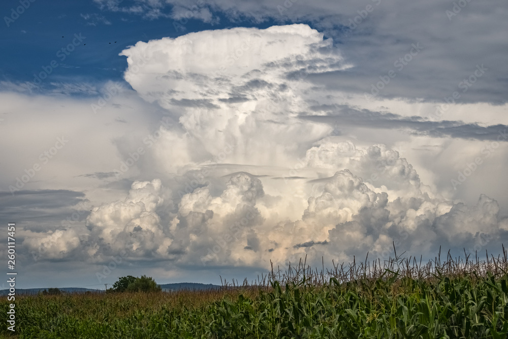 Towering thunderstorm over the landscape of Transylvania in Romania Towering thunderstorm over the landscape of Transylvania in Romania