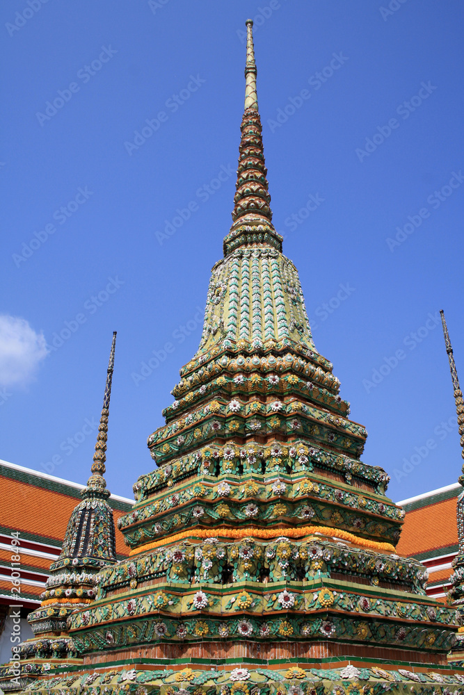 07 February 2019, Bangkok, Thailand, Wat Pho temple complex. Buddhist stupas and architectural details. 07 February 2019, Bangkok, Thailand, Wat Pho temple complex. Buddhist stupas and architectural details.