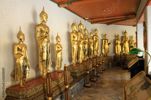 07 February 2019, Bangkok, Thailand, Wat Pho temple complex. Alley with Golden Buddhas © taushka