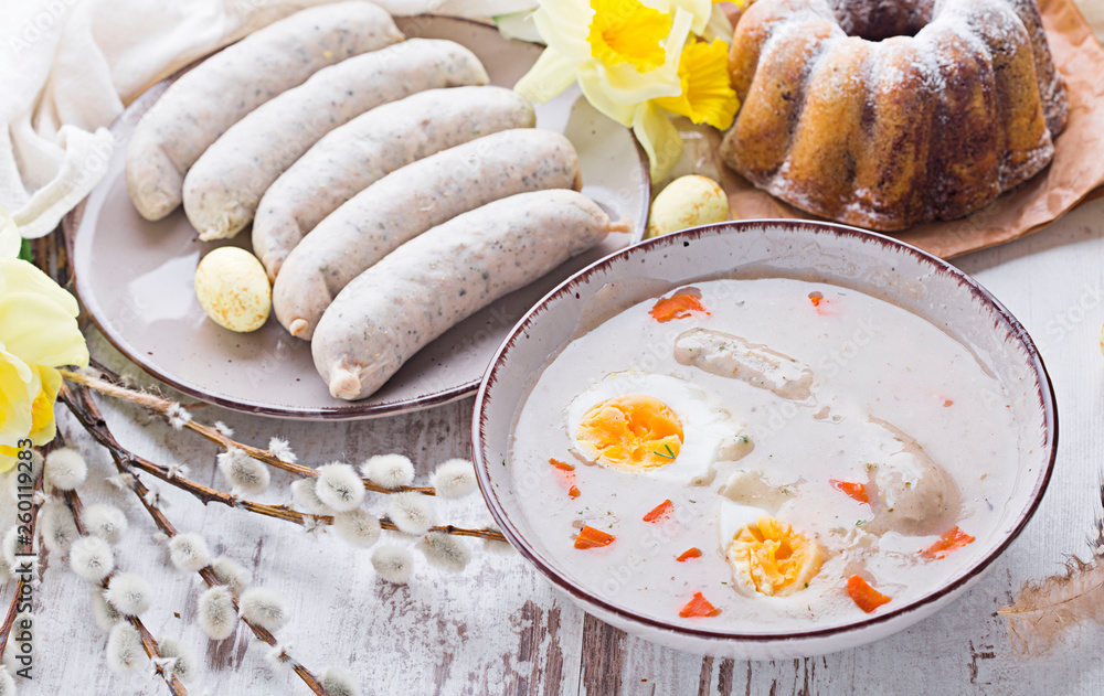 Easter breakfast. Sour rye soup with eggs and sausage