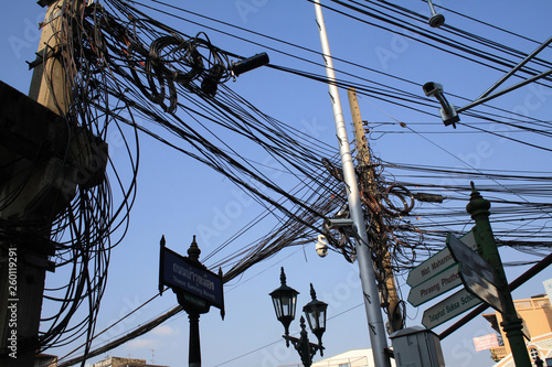 07 February 2019, Bangkok Thailand. Lot of wires on the street poles.
