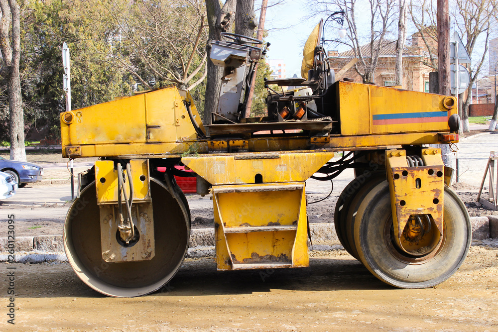 Paver is waiting for work. The old model, past many kilometers of roads. Paver is waiting for work. The old model, past many kilometers of roads.