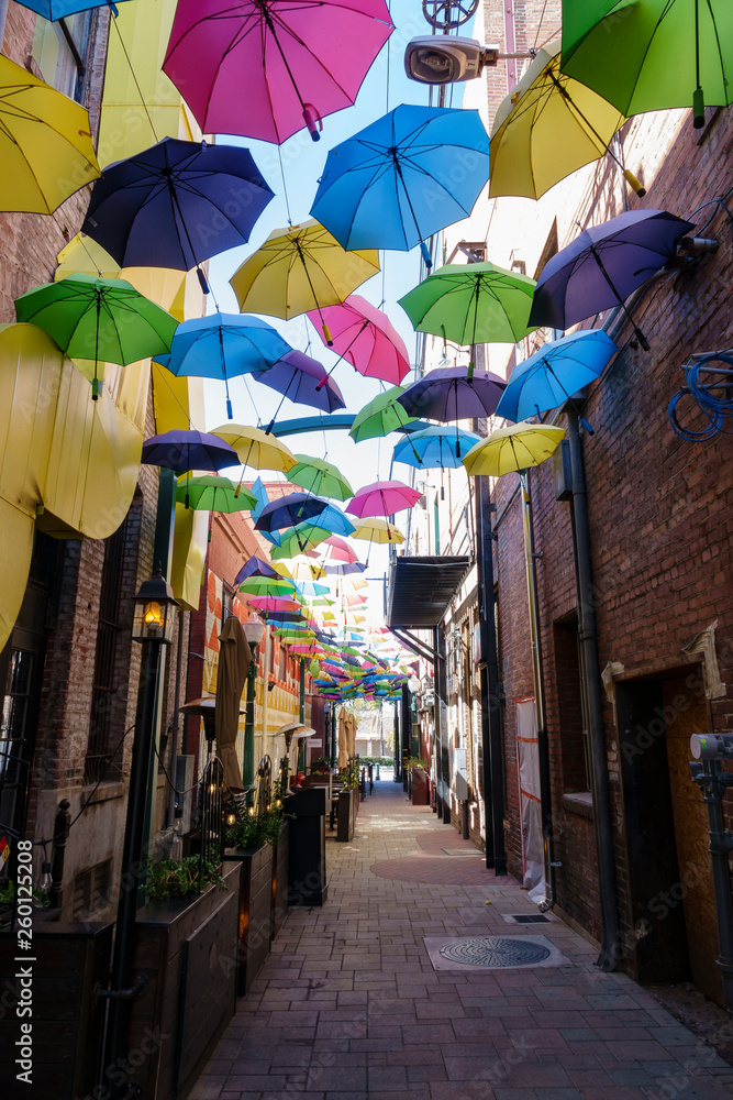 Colorful umbrellas hanging in the famous Orange Street Alley
