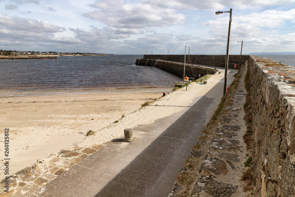 Pier and beach in Galway Bay