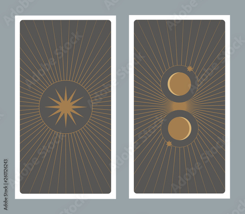 Back of Tarot card decorated with stars, sun and moon