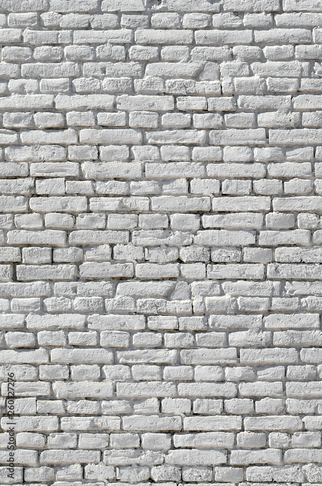 Texture of the wall of brick, painted white