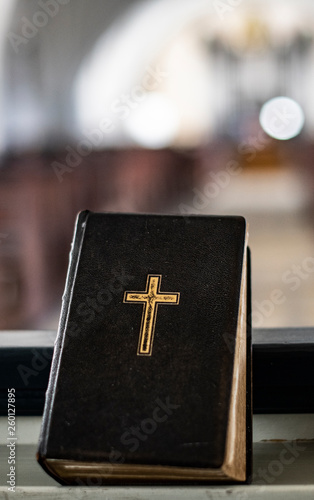 Fotografie, Obraz Holy Book laying in front i a Scandinavian church`s room