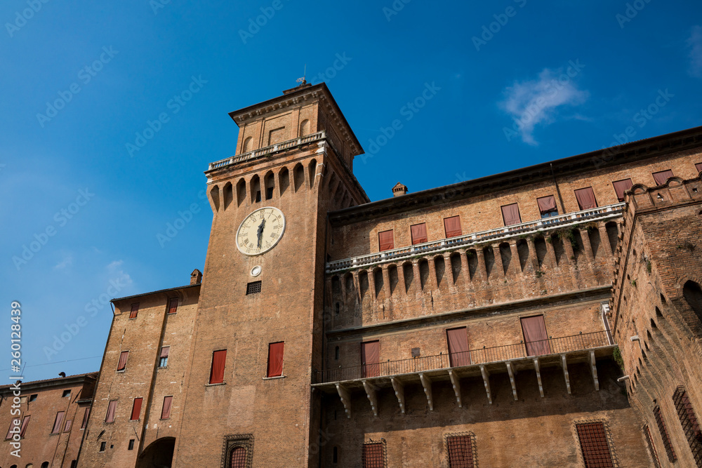 tower with clock, of Castello Estense, St Mchael's Castle, Ferrara, Italy