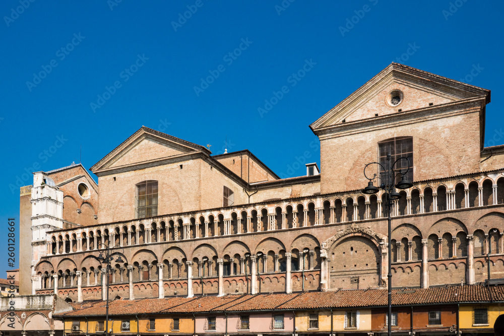 detail of building on square Piazza Treno e Trieste, in Ferrara, Italy