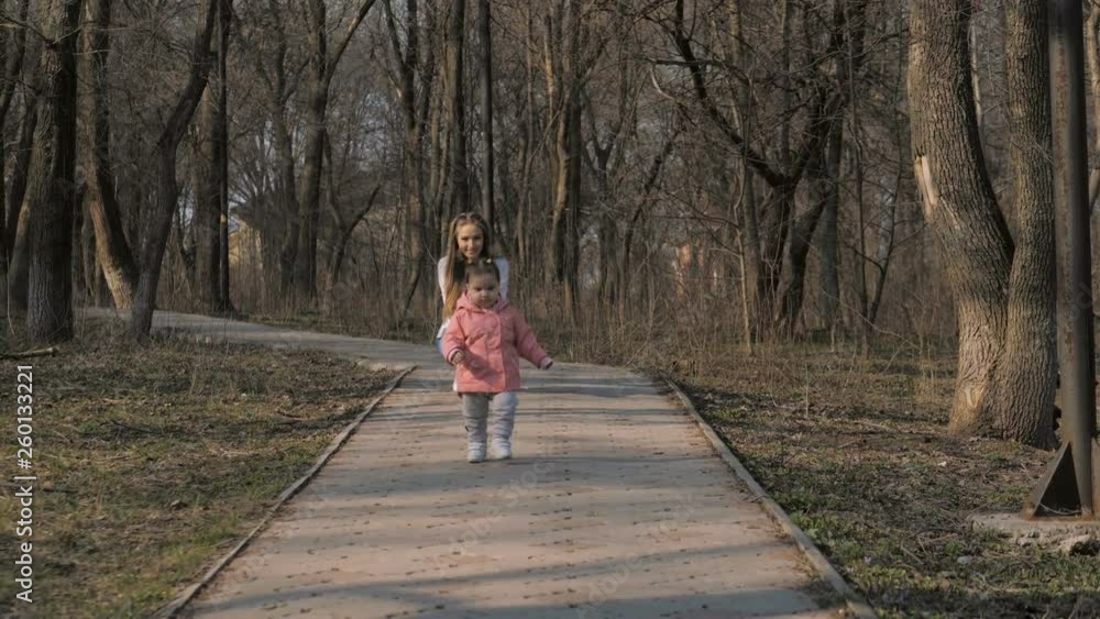 Baby girl playing in the park Baby girl playing in the park