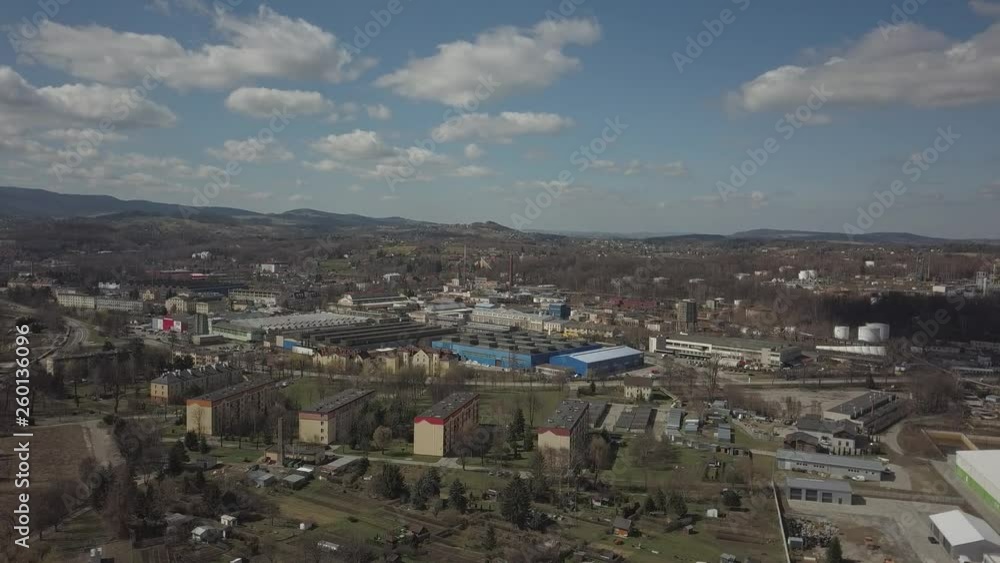 Gorlice, Poland - 3 9 2019: Industrial region of the Carpathian city. Top view of the refinery and auxiliary buildings. Video shot by drone or quadrocopter. Vanity of the day at the factory. Planning Gorlice, Poland - 3 9 2019: Industrial region of the Carpathian city. Top view of the refinery and auxiliary buildings. Video shot by drone or quadrocopter. Vanity of the day at the factory. Planning
