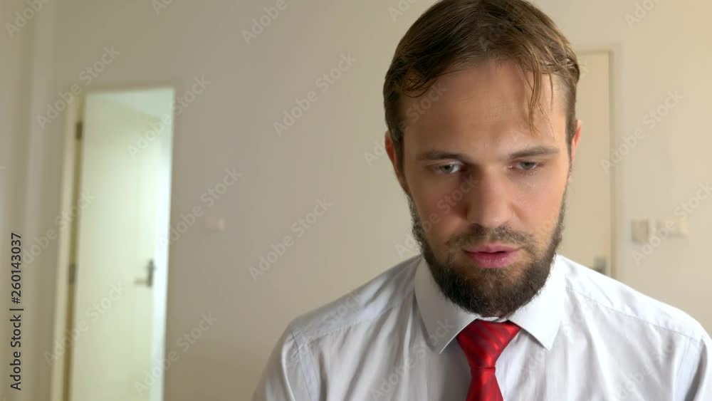 close-up, portrait of a tired exhausted businessman.close-up, portrait of a tired exhausted businessman who puts pills in his mouth close-up, portrait of a tired exhausted businessman.close-up, portrait of a tired exhausted businessman who puts pills in his mouth