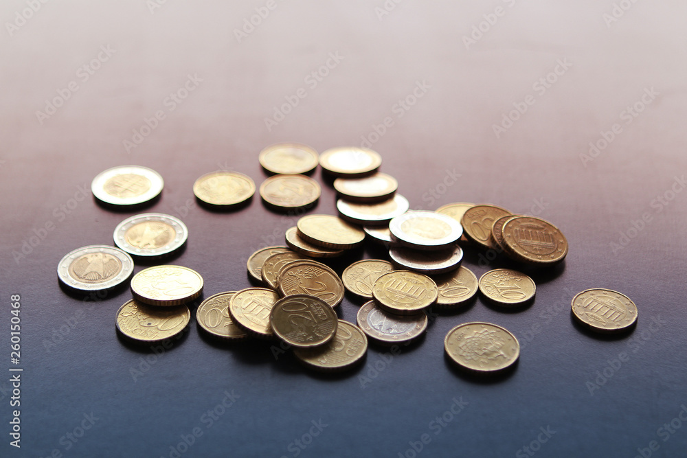 Closeup of silver and copper coins of all states on a dark background Closeup of silver and copper coins of all states on a dark background