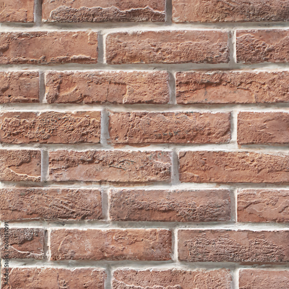 Fototapeta premium Brown brick wall as a background or texture