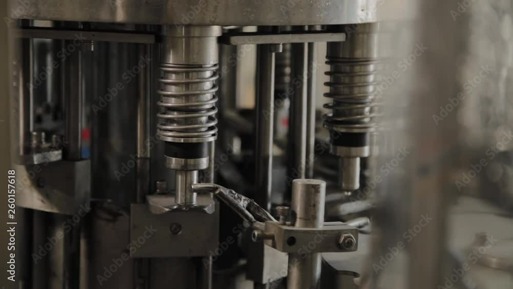 A stopped conveyor for bottling drinking water. Conveyor parts. A stopped conveyor for bottling drinking water. Conveyor parts.