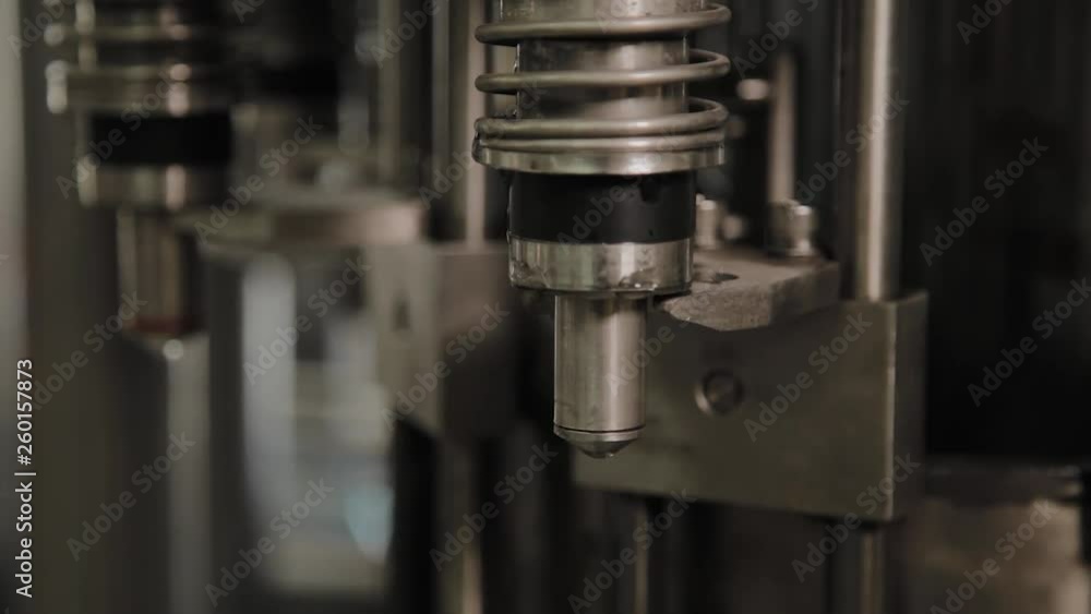 A stopped conveyor for bottling drinking water. Conveyor parts. A stopped conveyor for bottling drinking water. Conveyor parts.