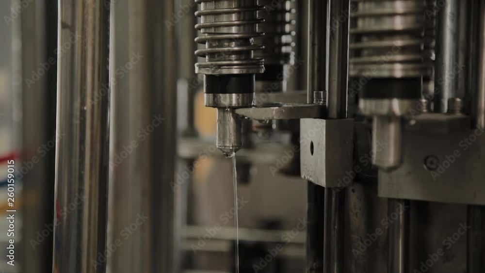 There is a conveyor for bottling drinking water. Details of the conveyor. There is a conveyor for bottling drinking water. Details of the conveyor.