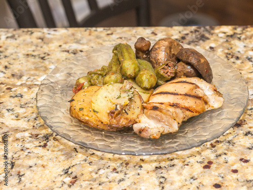 Paleo Meal:  Paleo meal of rosemary chicken, rosemary potatoes, okra, and grilled chicken.
