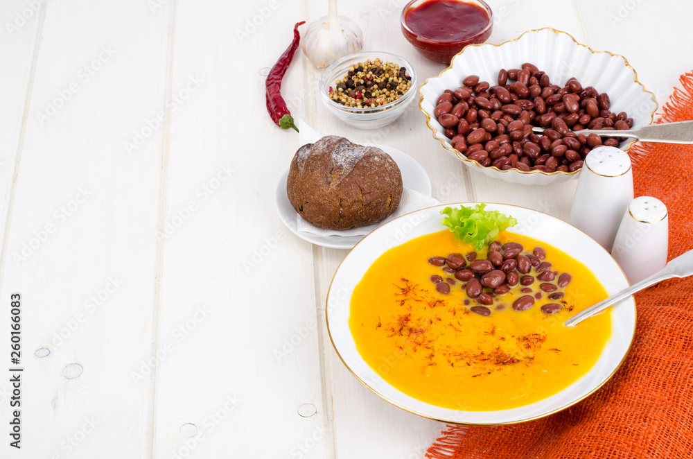 Vegetable vegetarian carrot pumpkin soup cream with red beans Vegetable vegetarian carrot pumpkin soup cream with red beans
