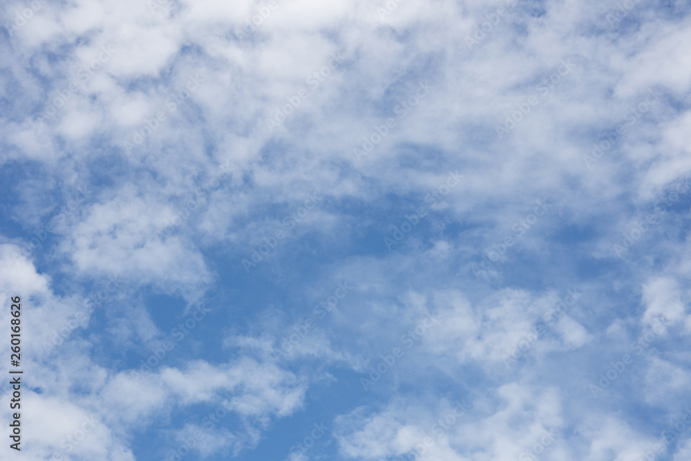 white fluffy clouds in the blue sky