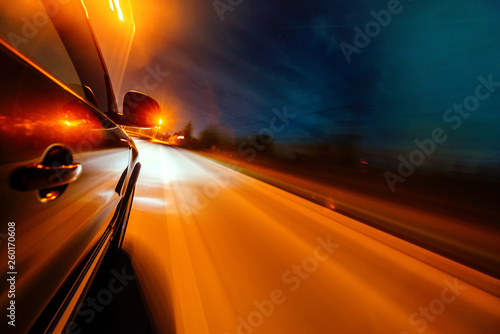 Car on the road with motion blur background.