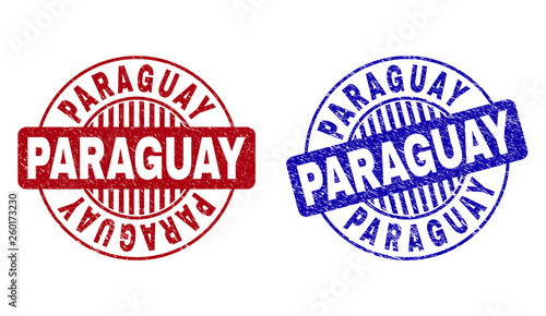 Grunge PARAGUAY round stamp seals isolated on a white background. Round seals with grunge texture in red and blue colors. Vector rubber imprint of PARAGUAY caption inside circle form with stripes.