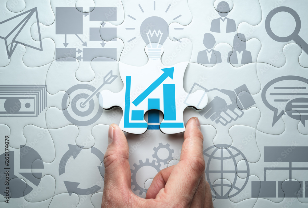 Finding solution to growth. Business development strategy concept.Connecting last jigsaw puzzle piece. Finding solution to growth. Business development strategy concept.Connecting last jigsaw puzzle piece.