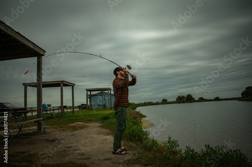 Fisherman In Action Standing Up Casting