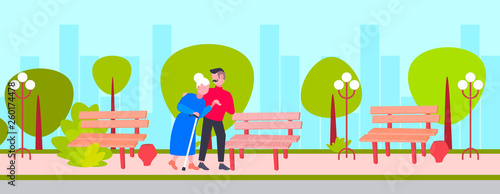young man helping elderly gray haired grandmother guy strolling with old lady city urban park care support concept cartoon characters full length flat cityscape background