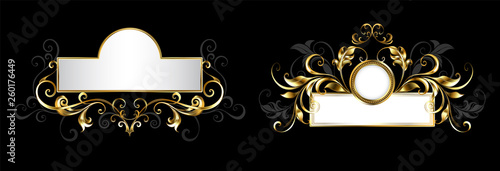 Two antique nameplates