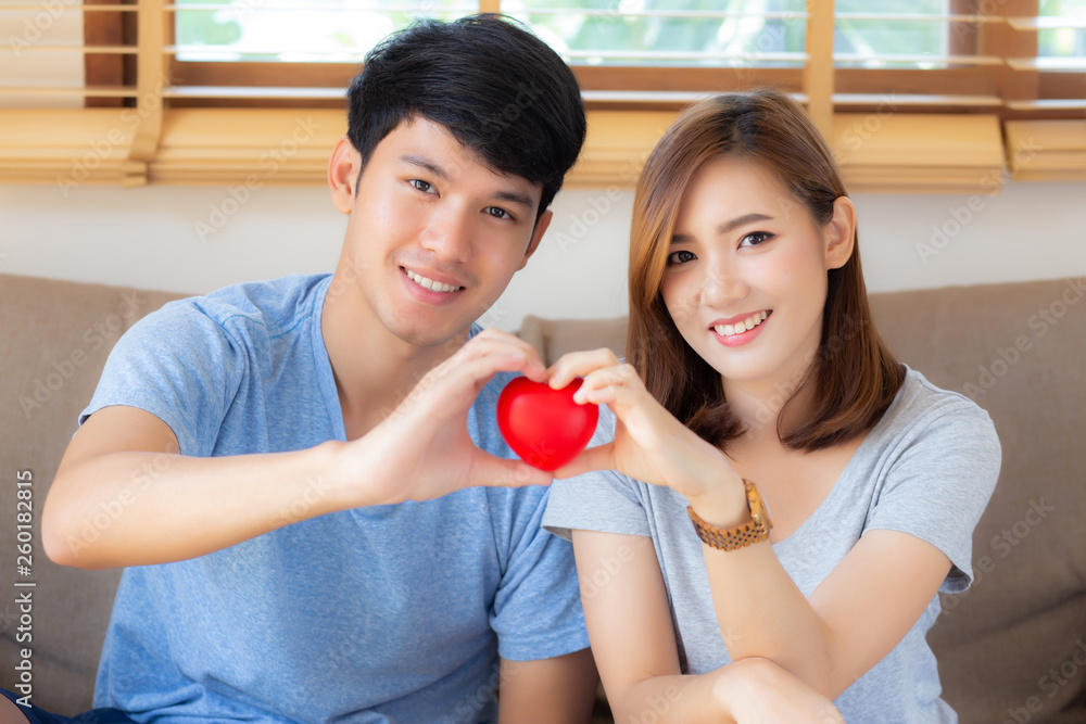 Beautiful portrait young asian couple gesture holding heart shape ...