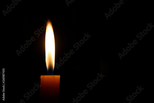 Candle flame or light at night On a black background