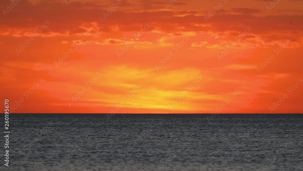 Intense Sundown Afterglow Loop - Seamless loop features an intensely colorful sky, just after sunset, over the Gulf of Mexico at Sanibel Island, Florida. Intense Sundown Afterglow Loop - Seamless loop features an intensely colorful sky, just after sunset, over the Gulf of Mexico at Sanibel Island, Florida.