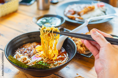 Spicy Japanese ramen noodle soup with egg, Japanese food culture.