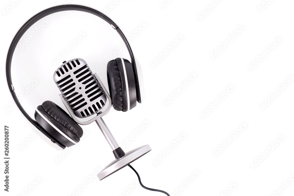 Retro microphone and headphones isolated on white background Retro microphone and headphones isolated on white background