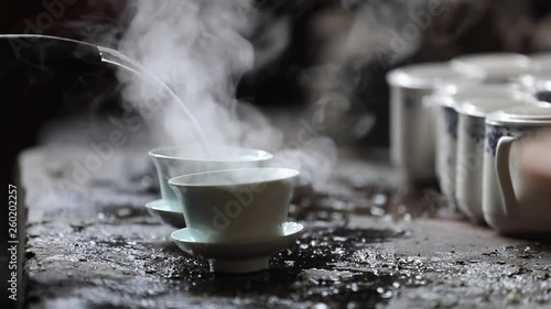 Wallpaper Mural Pouring hot water into porcelain teacup Torontodigital.ca