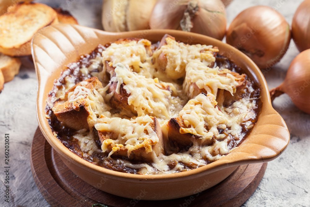 Delicious onion soup with croutons and cheese Delicious onion soup with croutons and cheese