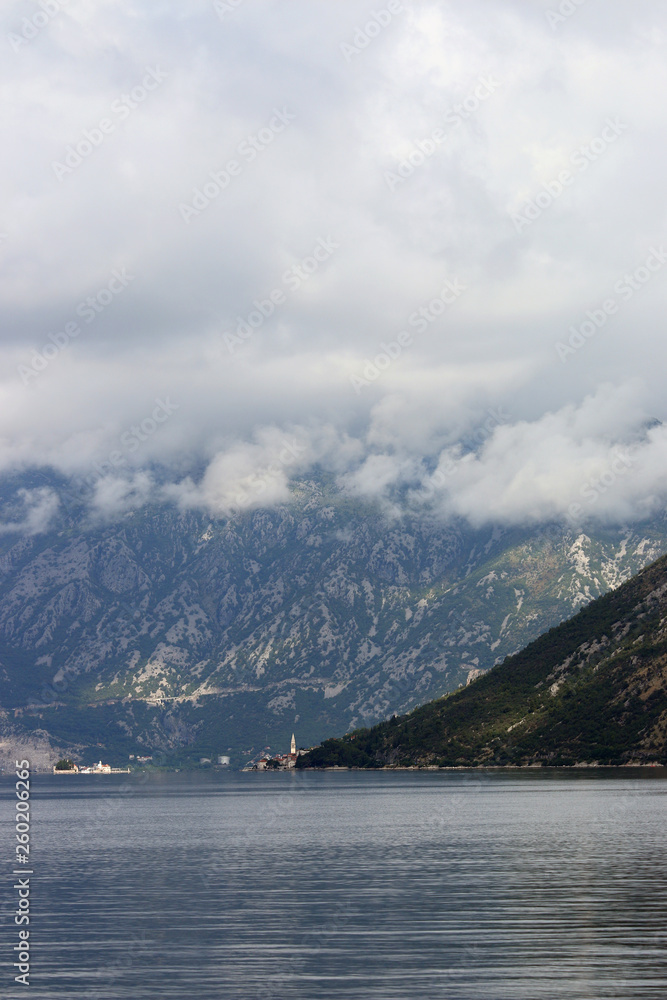 clouds above mountains town Perast Kotor bay landscape Montenegro