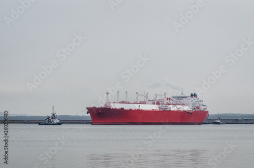 LNG TANKER - A large ship on a waterway with natural gas to the port of Swinouj  cie