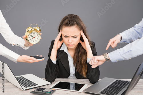 Tableau sur toile Female office worker is tired of work and exhausted.