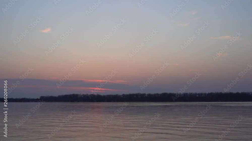 Beautiful sunset on the big river, the sun path burns with gold Beautiful sunset on the big river, the sun path burns with gold